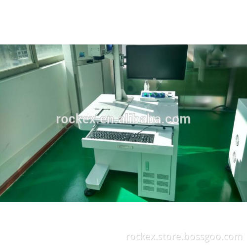 Laser marking caving machine for scissors caving on toner cartridge